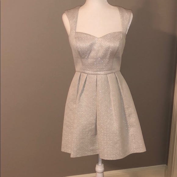 Guess Dresses & Skirts - Silver sparkly dress from GUESS